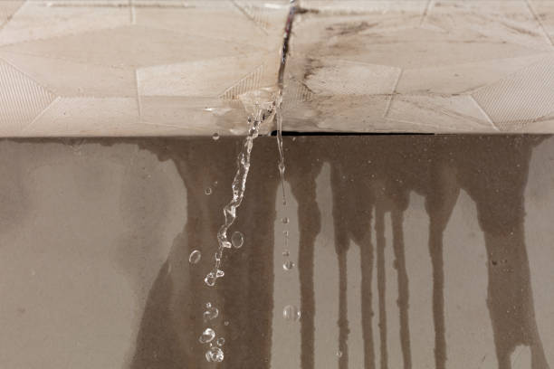 Professional Flood Damage Cleanup technician working in Rouseville, PA